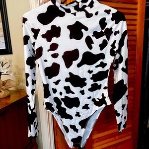 Long sleeve body suit size small. New never worn